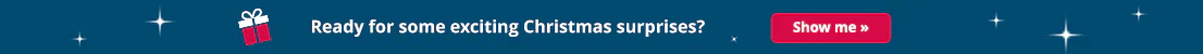 The advertising banner has a petrol-coloured background. The words ‘Ready for exciting Christmas surprises?’ are written in large white letters, along with a call to action with the text ‘Show me’. Next to it is a picture of a gift in white and red.