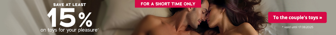 A couple is lying close together and in a relaxed way on a bed. The atmosphere is warm and intimate. There is an eye-catching banner in the foreground with the words "Save at least 15% off couple's toys, valid until 17.08.2025. The words "For a short time only" can also be seen on the advertisement. The advertisement is focussing on togetherness, love and an exclusive offer for couple's toys.