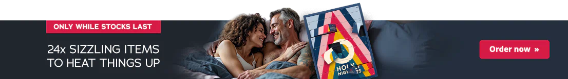 The advertisement has a picture of a topless man who is lying arm in arm with a woman wearing a white top. They in bed and smiling at each other. The words “Only while stocks last!” can be seen above them on a red background. The words “24x sizzling items to heat things up!” are in white letters and can be seen below that on a dark background. Next to it is a colourful Advent calendar with the text “HOLY NIGHTS”.