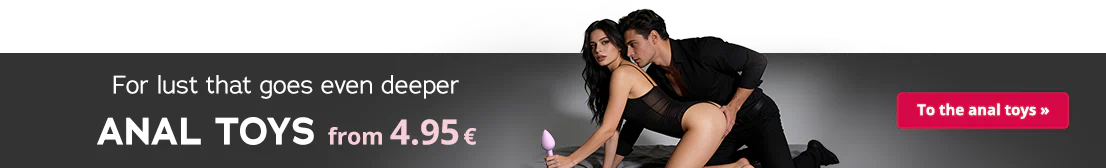 A woman and a man are kneeling on a bed. The man is kneeling behind the woman. The woman is wearing a black body and the man is wearing a black shirt with matching black trousers. The man has his head close to hers and his hand is on her backside. A purple butt plug can be seen on the advertisement and the text “Anal toys from 4.95€” is written in large letters.