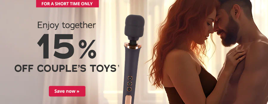 The advertisement has a picture of a man and a woman that are standing so that they are facing each other and touching. The man is topless and the woman is wearing a black top. There is a black massage wand next to them. Light and slightly transparent curtains can be seen in the background. The sun is shining through the curtains. The words “Enjoy together – 15% off couple’s toys” are written in large black letters. There is a red button at the top of the advertisement with the words “For a short time only” and there is another red button at the bottom of the advertisement with the words “Save now”.