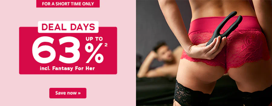 Two-part advertisement. One side has a pink background. There is a short element with a red background at the top with the words “For a short time only”. There is a red rectangle with rounded corners in the middle of the pink background with the text: Up to 63% incl. Womanizer. There is a rectangle above that with a white background and large red letters that say: “DEAL DAYS”. There is a picture on the other side of the advertisement. The picture shows a woman from behind. You can see her back, buttocks and the upper half of her thighs. She is wearing red lace panties and black hold-up stockings with a lace trim. She is holding a black toy in her hand behind her buttocks. You can see a man lying on a sofa in the background. He is topless and looking in the direction of the woman. There is a call-to-action button at the bottom with a red background and the words “Save now »”.