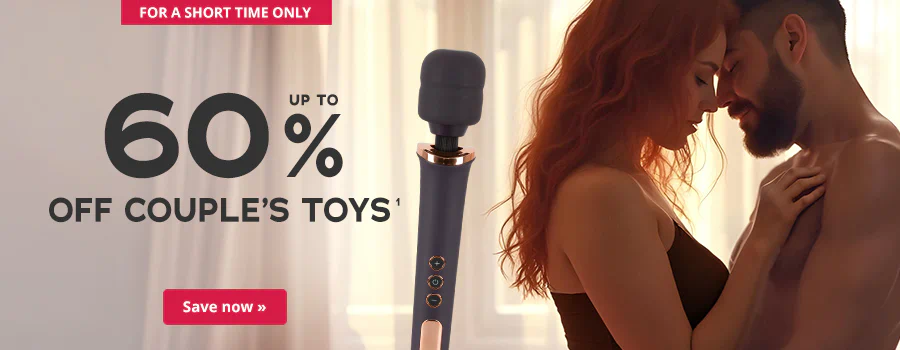 The advertisement has a picture of a man and a woman that are standing so that they are facing each other and touching. The man is topless and the woman is wearing a black top. There is a black massage wand next to them. Light and slightly transparent curtains can be seen in the background. The sun is shining through the curtains. The words “Up to 60% off couple's toys” are written in large black letters. There is a red button at the top of the advertisement with the words “For a short time only” and there is another red button at the bottom of the advertisement with the words “Save now”.