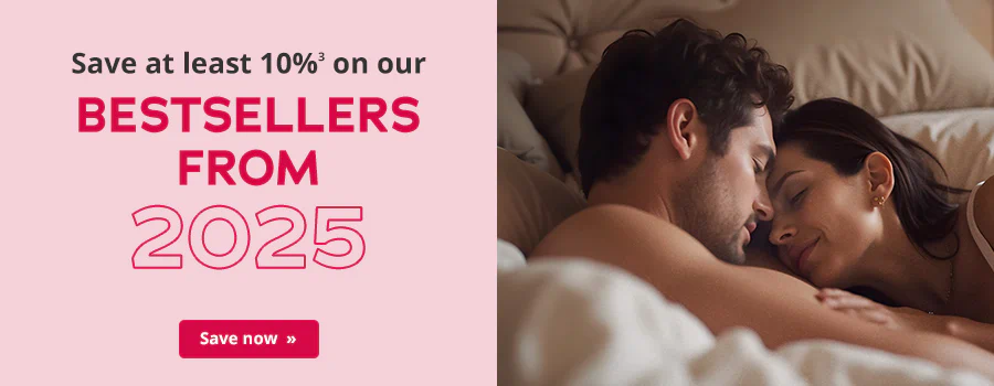 Couple lying close together and relaxed in bed. Text: 'Save at least 10% on our bestseller from 2025'. CTA: 'Save now'