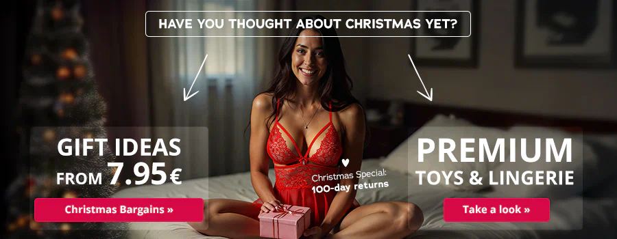 The advertisement has a picture of a woman sitting on a bed and smiling. She is wearing red lingerie. There is some text at the top that says, “Have you thought about Christmas yet?”. A decorated Christmas tree can be seen in the background. The woman is holding a gift in her hands. The text “Christmas Special: 100-day returns” and a heart symbol can be seen in front of her. There are two large boxes that each have a different message. One says “Gift ideas from 7.95€” in white letters and has a red button underneath that with the text “Xmas Bargains”. The other box has the text “Premium Toys & Lingerie” written in white letters and a red button underneath that with the text “Take a look”.