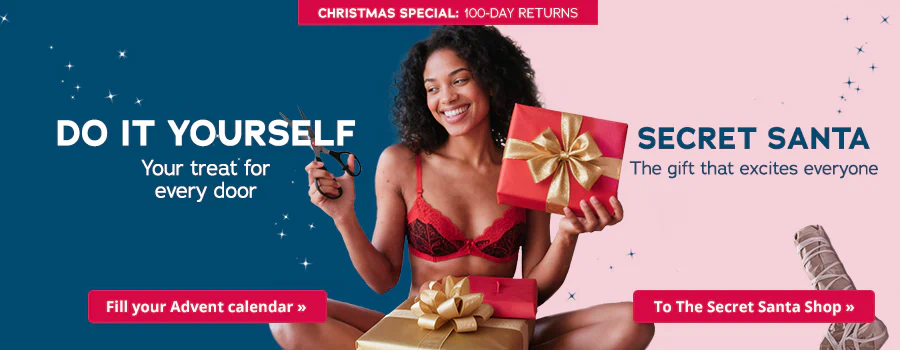 The advertisement is split into two parts. It says “Christmas Special: 100-day returns” at the top on a blue background. The words “Do it yourself: your treat for every door” can be seen underneath that on the blue background. There is a red button underneath those two things with the words “Fill your Advent calendar”. The other side of the advertisement has a pink background. There are blue words on this side that say “Secret Santa – the gift that excites everyone”. There is a red button underneath the text that says “Find your gift”. There is a woman in red lingerie over both of the coloured backgrounds. She has some scissors in her hand and there are some wrapped gifts lying in front of her.
