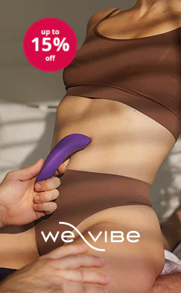 Woman in brown underwear holds We-Vibe sex toy; man controls it via app on smartphone. Text: “up to 15% off”, “We-Vibe”, button "Buy now and save”