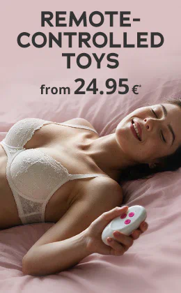 A smiling couple is lying on a dark bed. The woman is wearing black lingerie and the man is holding a white remote control in his hand. The text says: “REMOTE-CONTROLLED TOYS” and “from 24.95€”. There is also a red banner with the text “Get connected »“ and "valid until 16.08.2026".