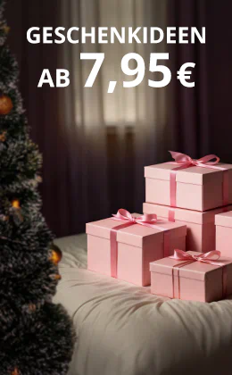 Auf der Werbeanzeige sind viele rosa verpackte Geschenke zu sehen, welche neben einem Tannenbaum stehen. Großflächig steht in weißer Schrift "Geschenkideen ab 7,95€" Im unteren Bereich steht in einem rotfarbenen Button "Zum Angebot".