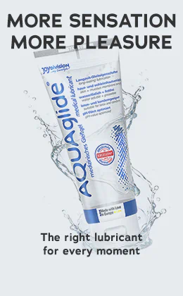 The Aquaglide lubricant is shown against a backdrop of splashing water. “MORE SENSATION, MORE PLEASURE” can be seen above it. “The right lubricant for every moment” can be seen below it. There is a red button at the bottom with the text “Discover Joydivision »”.
