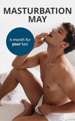 A topless man is sitting on a bed with white bedding. His eyes are closed and his hand is on his mouth. There is some large text that says: “MASTURBATION MAY – Still looking for toys for him?”. There is red button at the bottom with the text: “To the toys for men selection »”.
