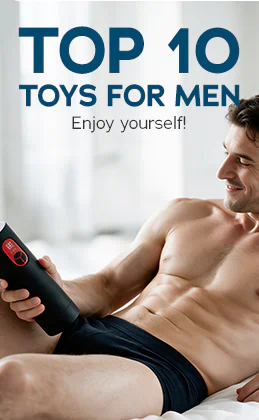 Smiling shirtless man on a bed holding a black product. Text: "Top 10 Men's Toys – Get what you deserve!" Button: "Now it's your turn »"