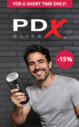 Advertising banner for PDX Elite with 15% discount, man holding a masturbator, ‘Go to promotion’ button, grey background, limited-time offer.