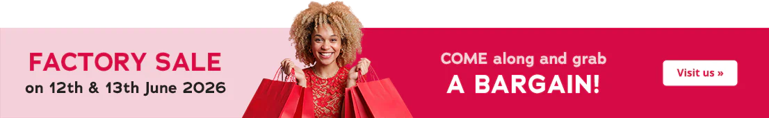 Red banner for a Factory Sale with a smiling woman in a red outfit holding red shopping bags. Text: 12TH & 13TH JUNE 2026, FACTORY SALE, COME along and grab A BARGAIN! CTA: Visit us ».